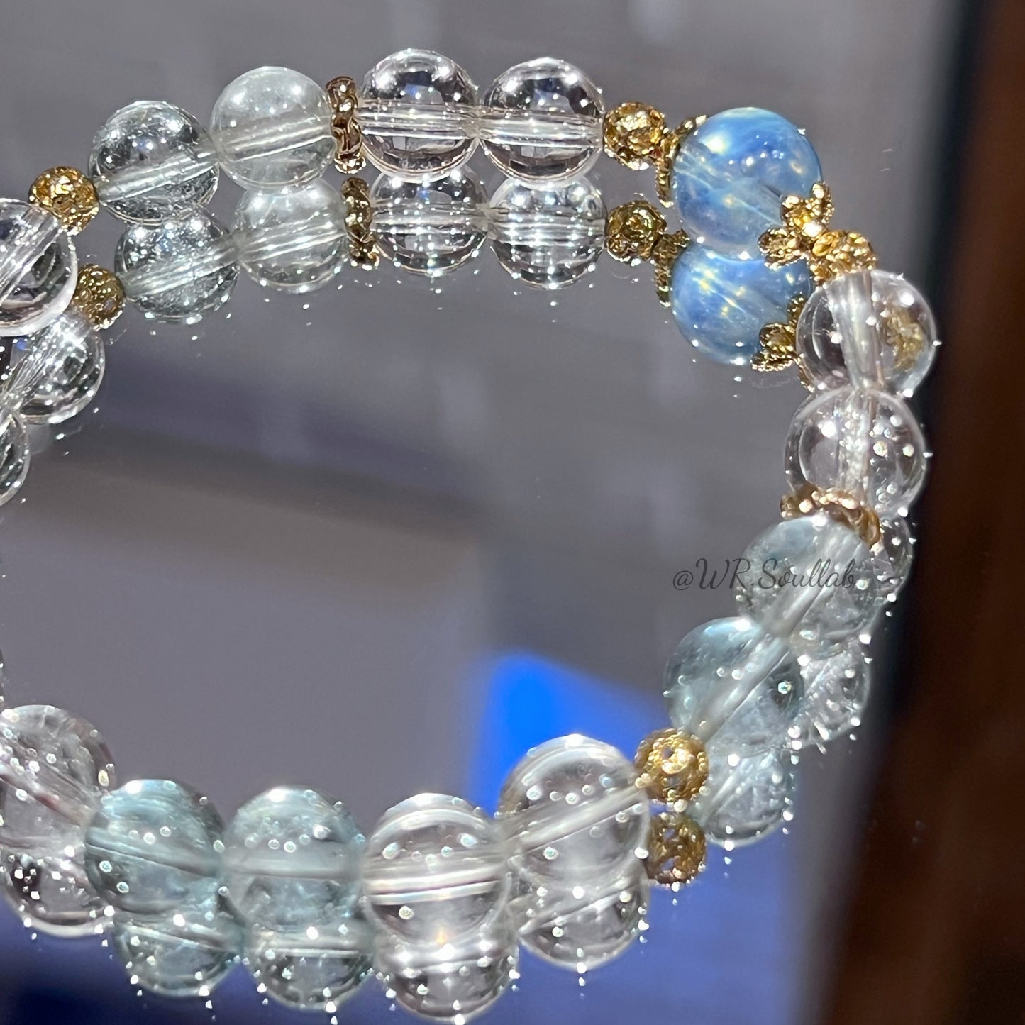 Blue Topaz Aquamarine and White Crystal Design Bracelet